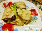 A picture of Tuna (fillet), baked on cabbage steaks, with cheese.