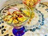 A picture of Vegetable salad with radish, cheese and nuts.