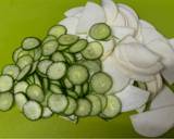 A picture of step 2 of Turnip and Cucumber Salad.